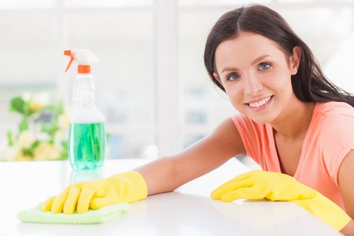 Carpet cleaning team following safe working practices at a job site
