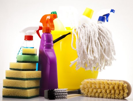 Cleaning specialist using protective measures and equipment checks